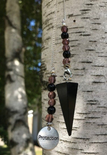 Pendule hexagonal en tourmaline noire
