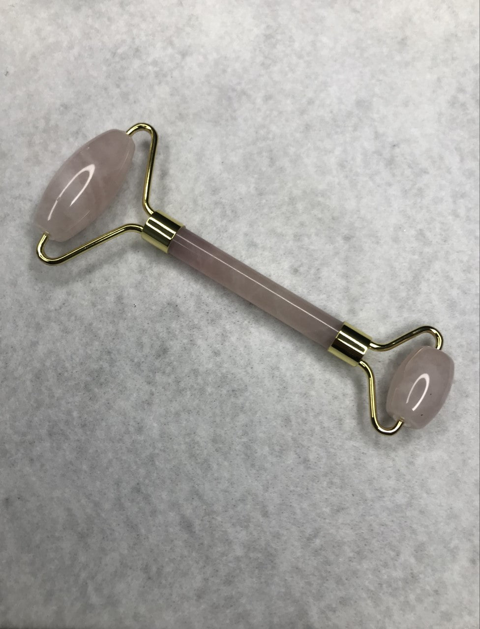 Rouleau à massage en Quartz Rose